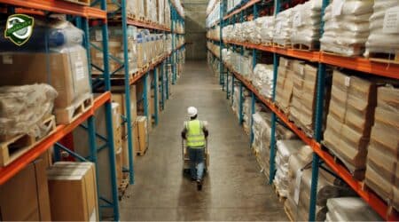 Modern commercial storage warehouse with organized pallets and boxes.