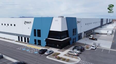 Modern warehouse with organized pallets and forklift in aisle for 3PL operations